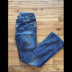 Low rise, straight leg, slightly distressed denim